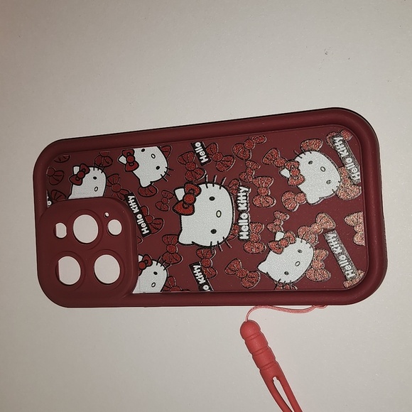 Brand new Apple IPhone 15 Pro Hello Kitty Silicone Phone case w. Wrist strap - Picture 2 of 10